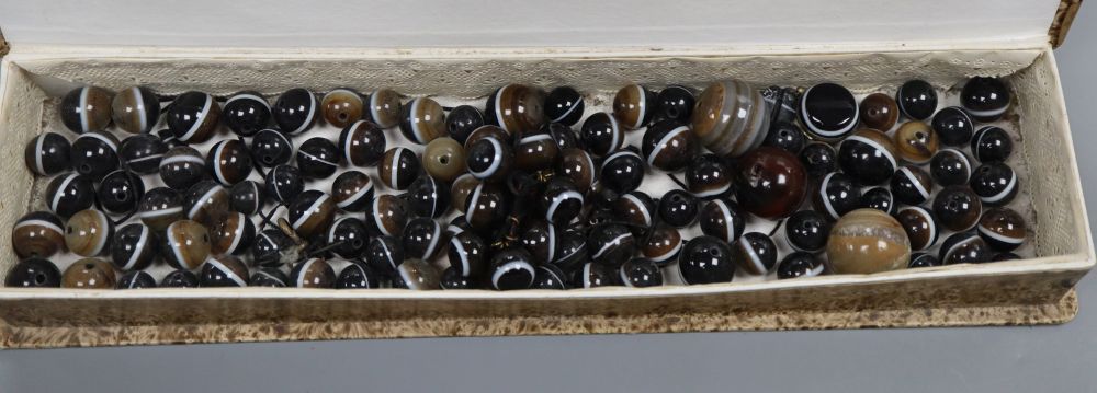 A large group of assorted banded agate beads.